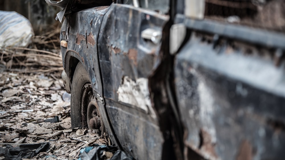 junked black pickup truck