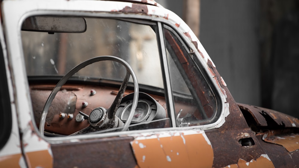 vintage brown and white car during daytime