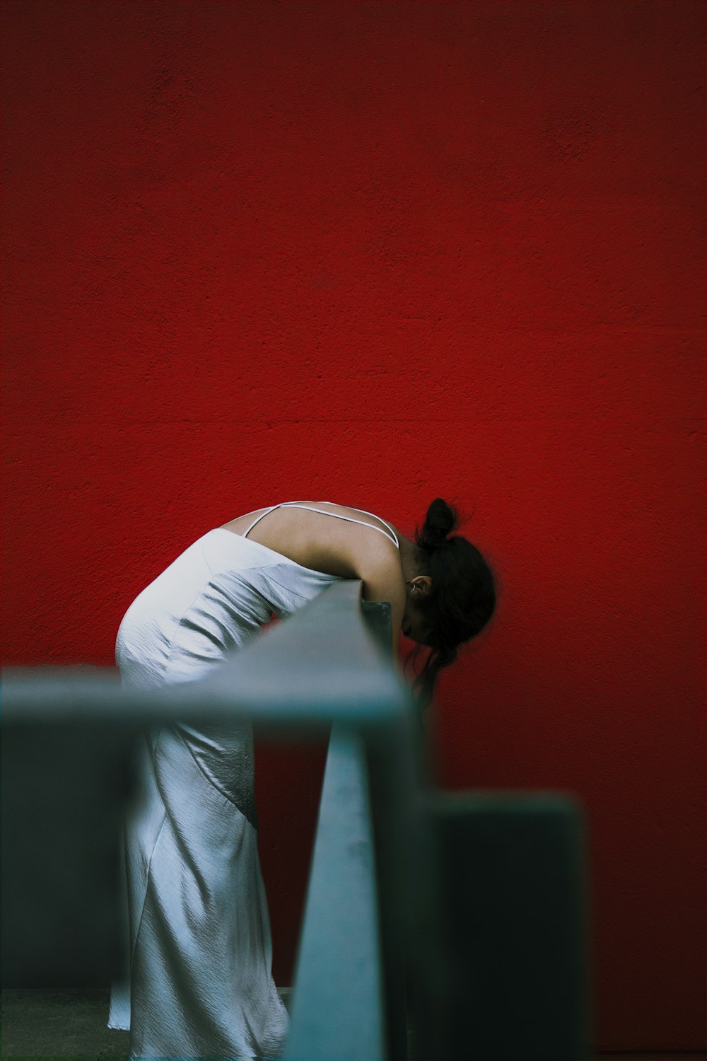 women lying in a balcony close-up photography