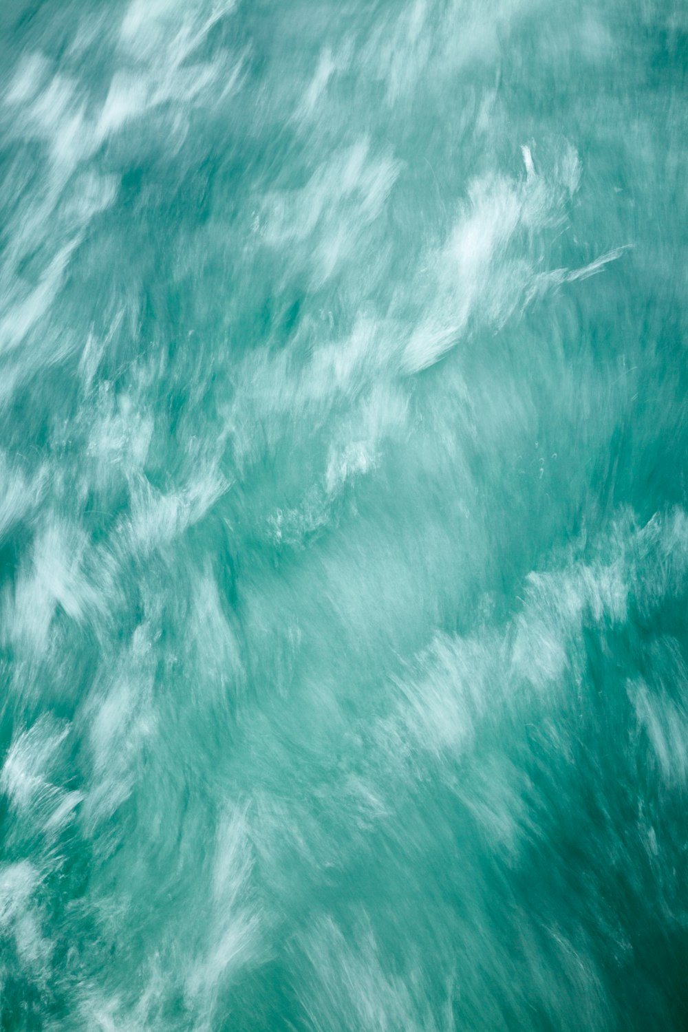 a large body of water with a boat in it