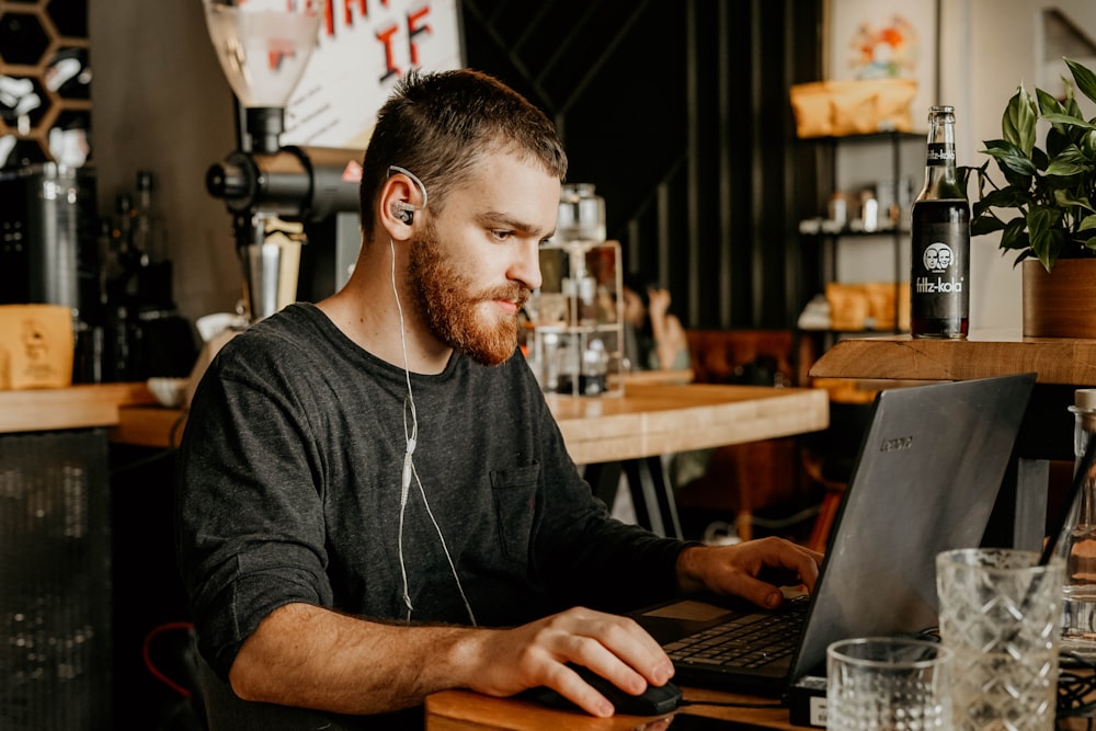 man using laptop