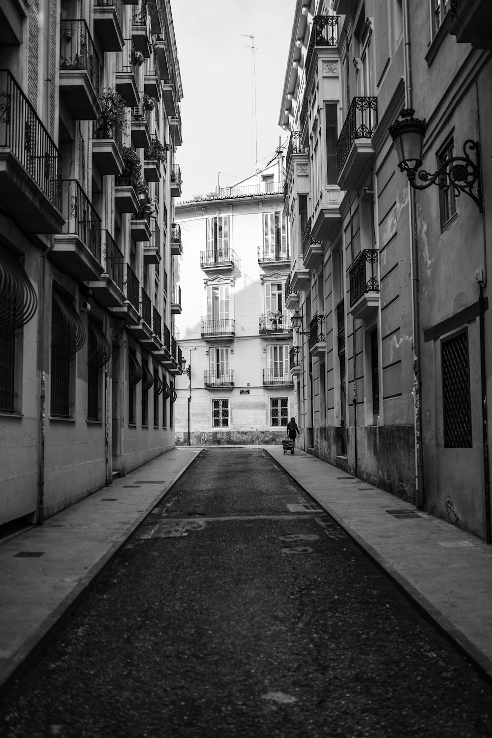 greyscale photo of buildings