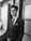 A well-dressed man in a stylish blazer standing confidently.