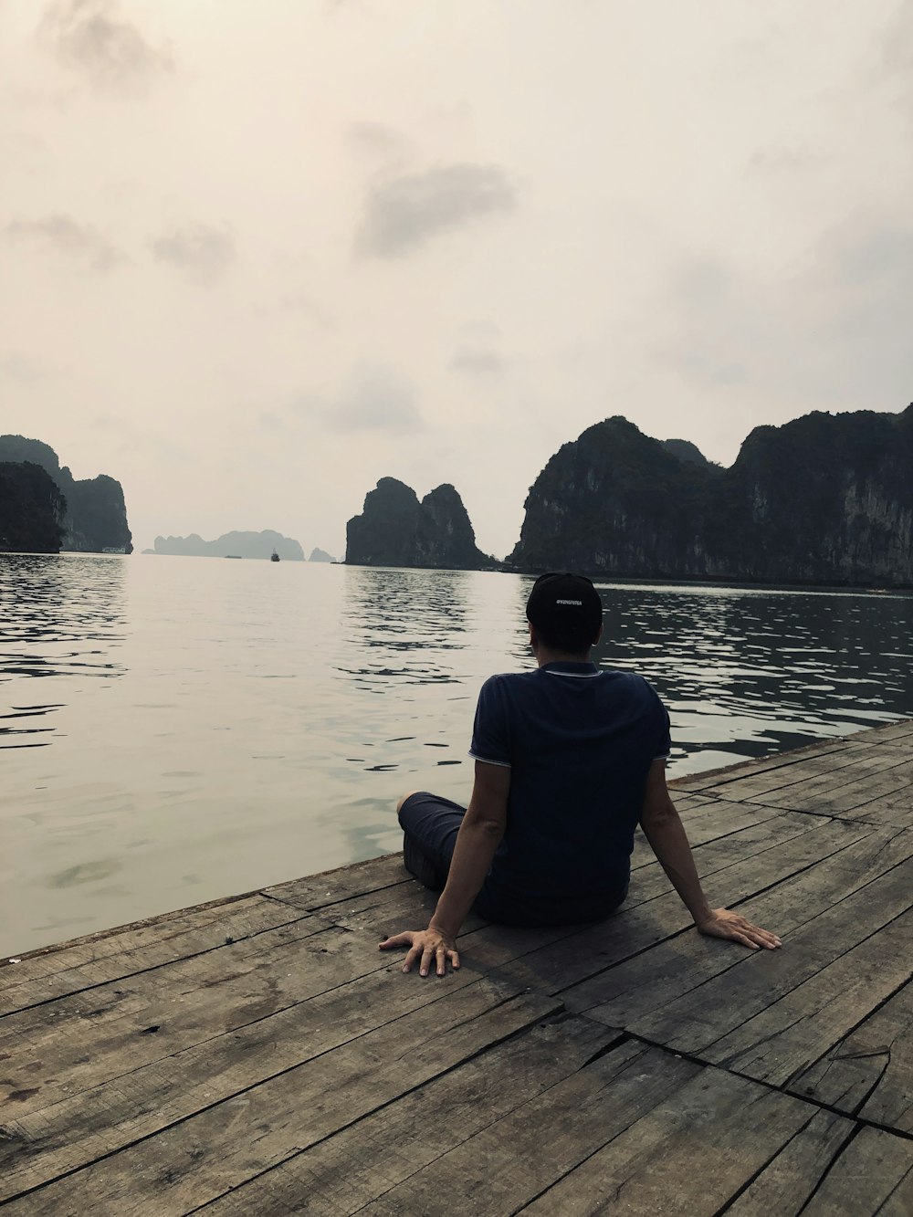 man sitting on duck