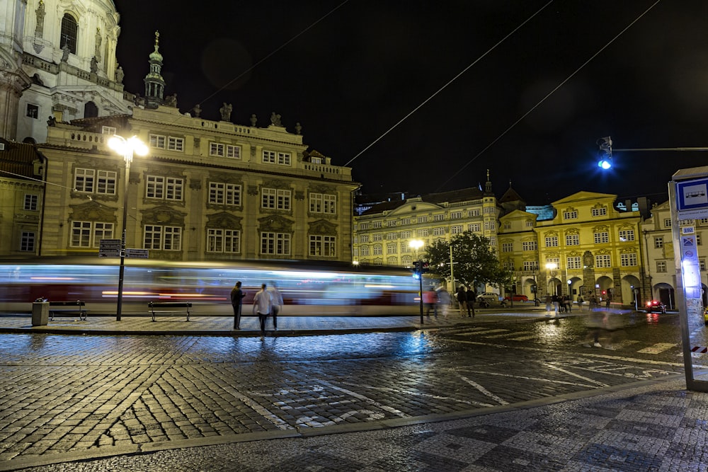 a blurry photo of a city street at night