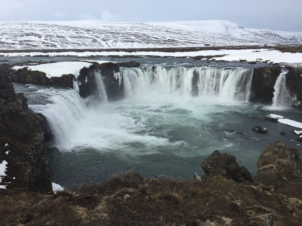 waterfall during daytime