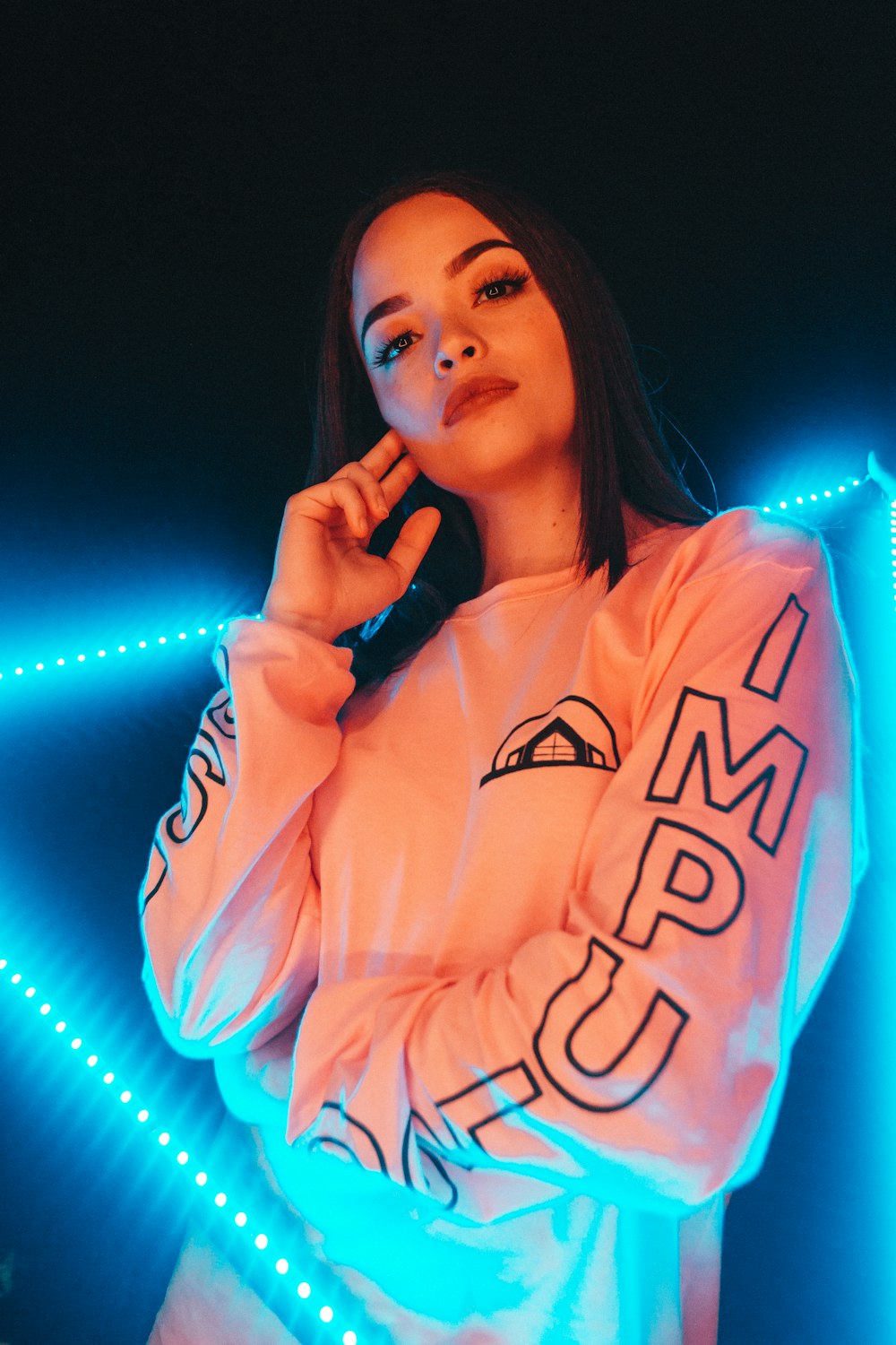 woman in pink sweatshirt