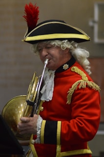 Regal Rhythm posing in a posh British royal-inspired ensemble, with subtle musical symbols woven into the fabric.