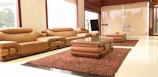 Living area of family suite with comfortable sofas and warm lighting.