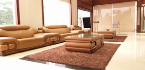 A custom-made leather sectional sofa arranged in a cozy, stylish lounge.
