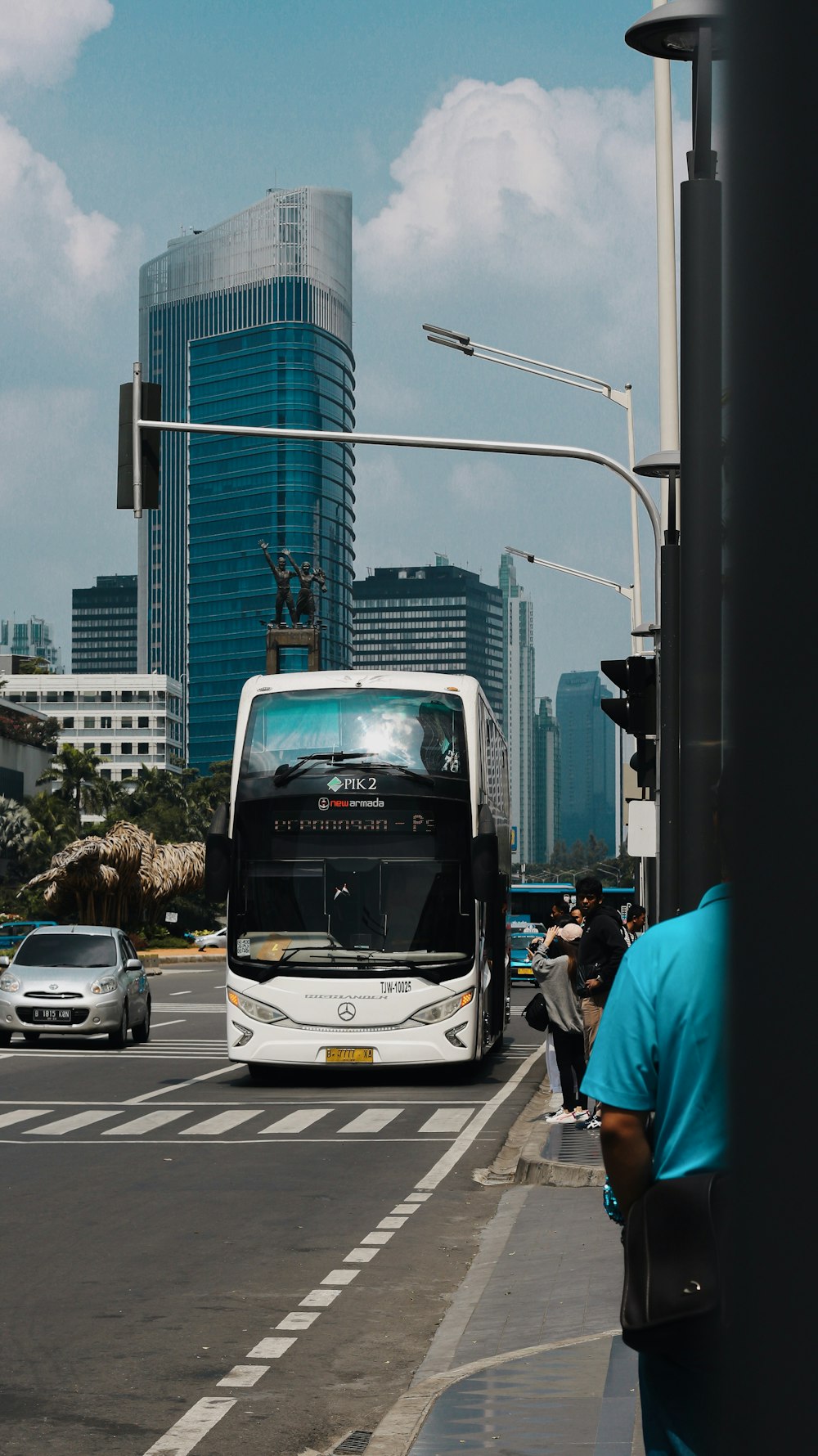 white bus running on road