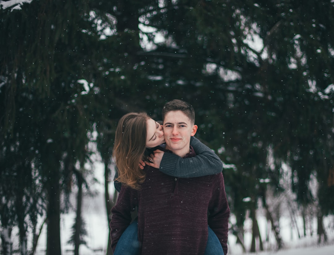 couple standing near tree