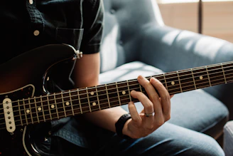 person playing guitar