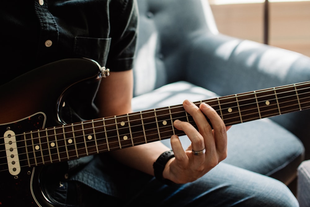 person playing guitar