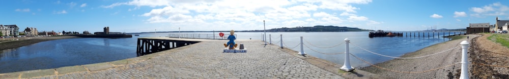 blue body of water and dock