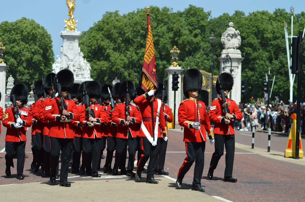 royal guards walking near people