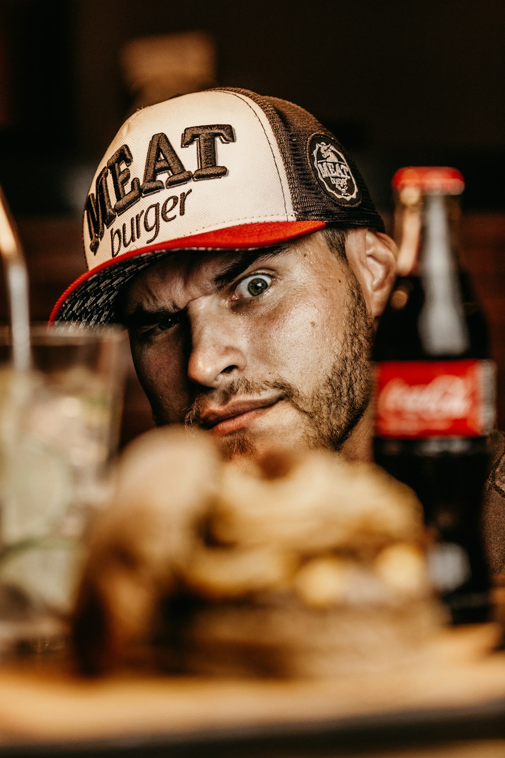 man in front of food tray