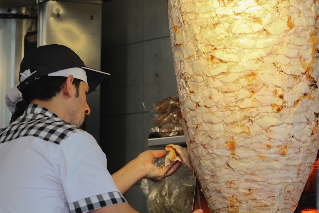 man standing meat,
