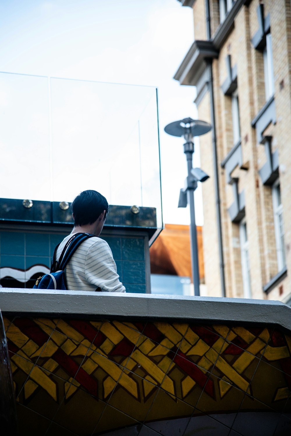 person walking near building