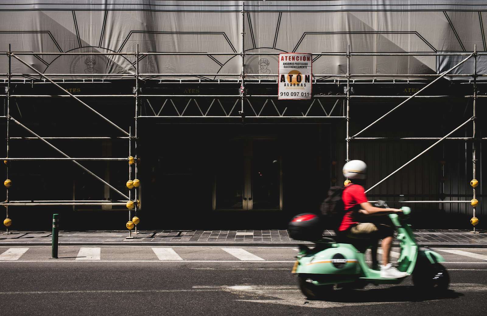 Leica M10-P sample photo. Man riding motor scooter photography