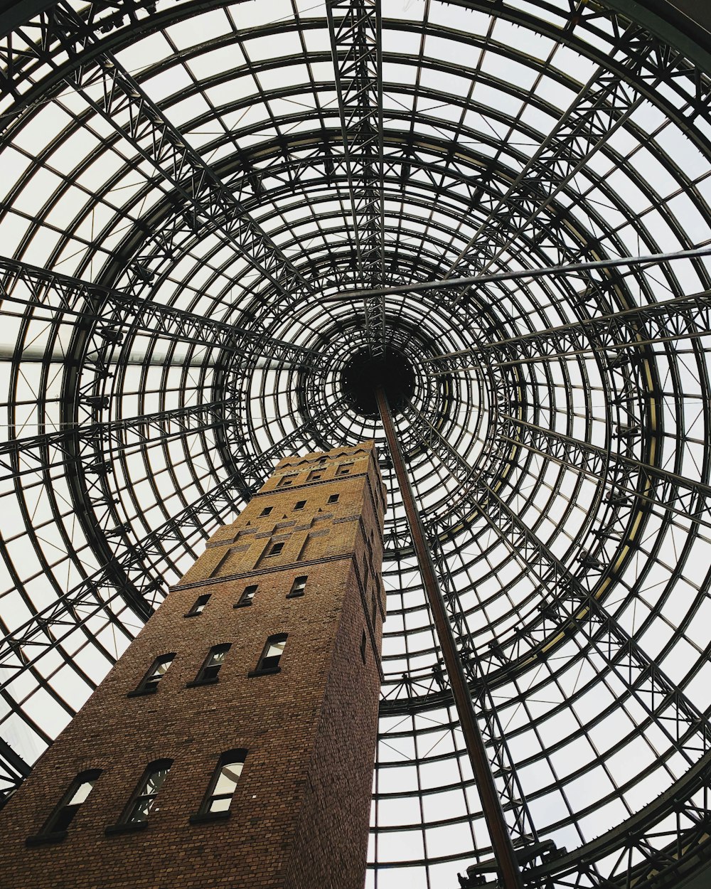 low-angle photography of brown building