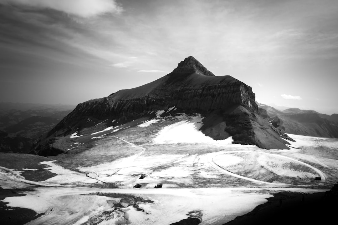 grayscale photo of a snowy mountain