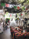 Bright dining area with traditional Andean textiles on chairs