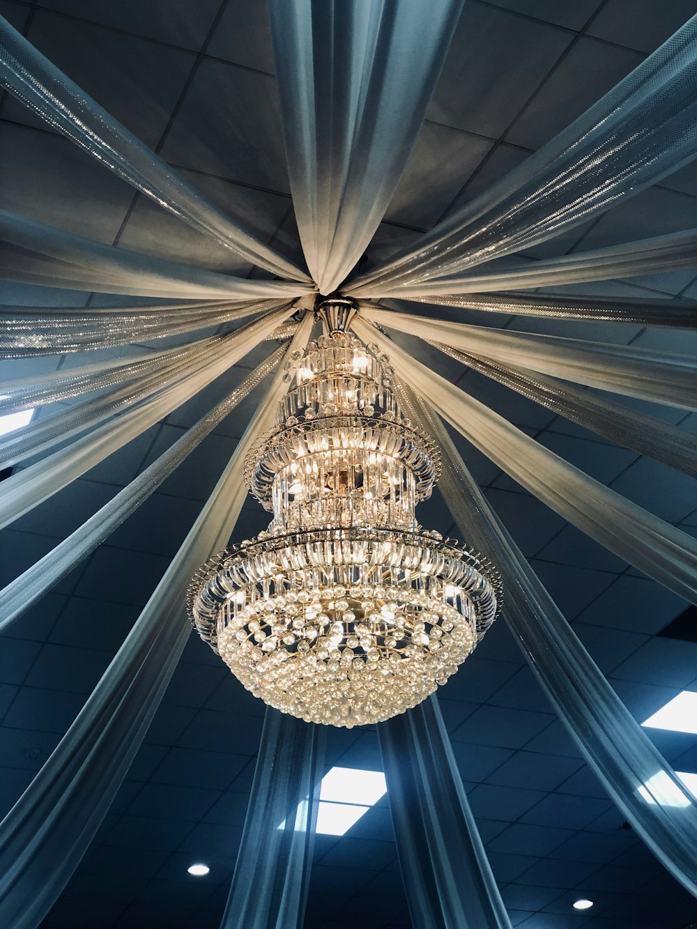 turned-on clear glass chandelier