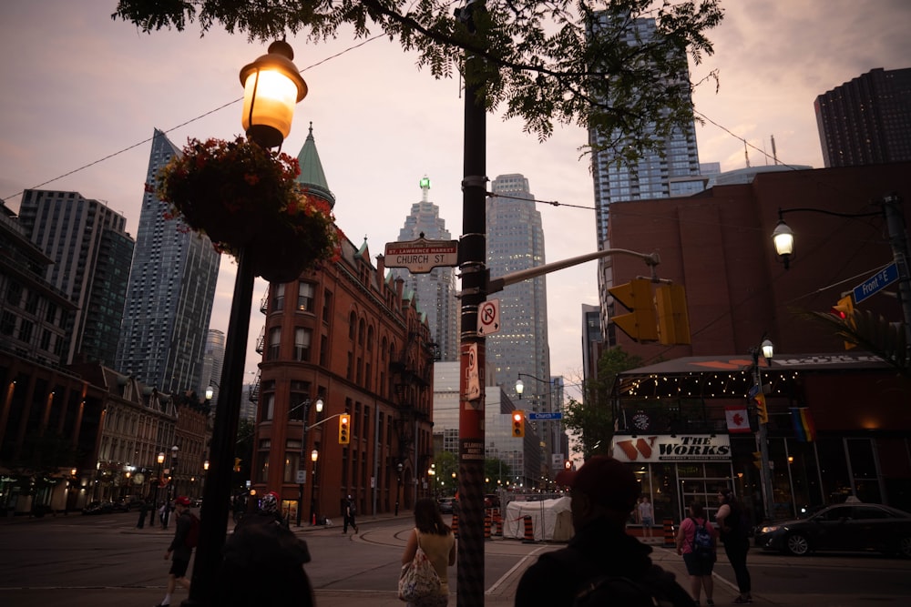 lamp post lighted along the streets of New York