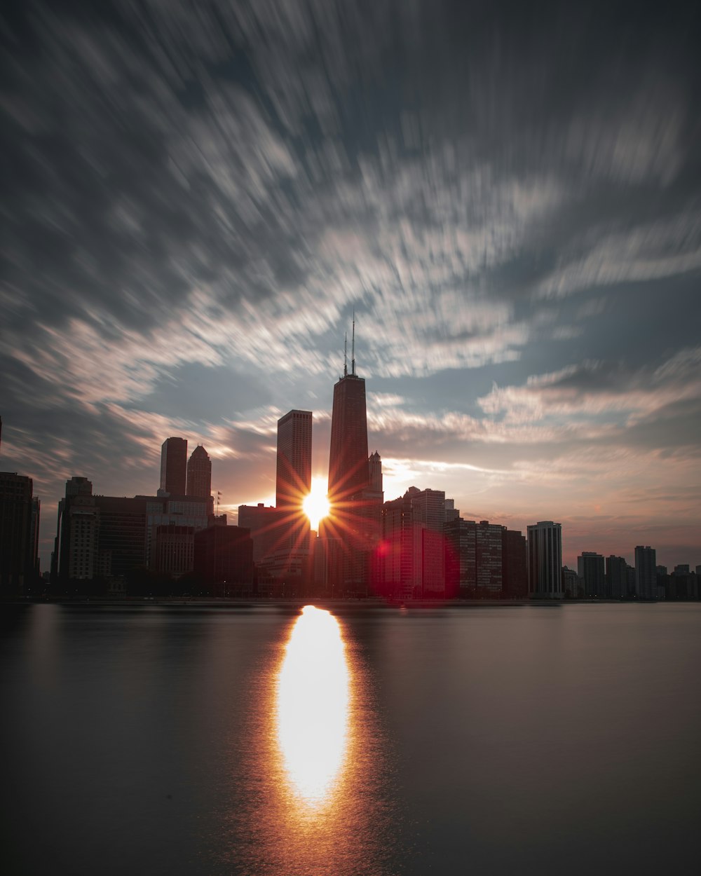 sun piercing through buildings