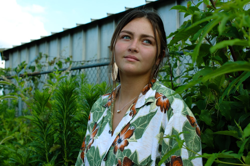 woman wearing white and brown floral collared shirt