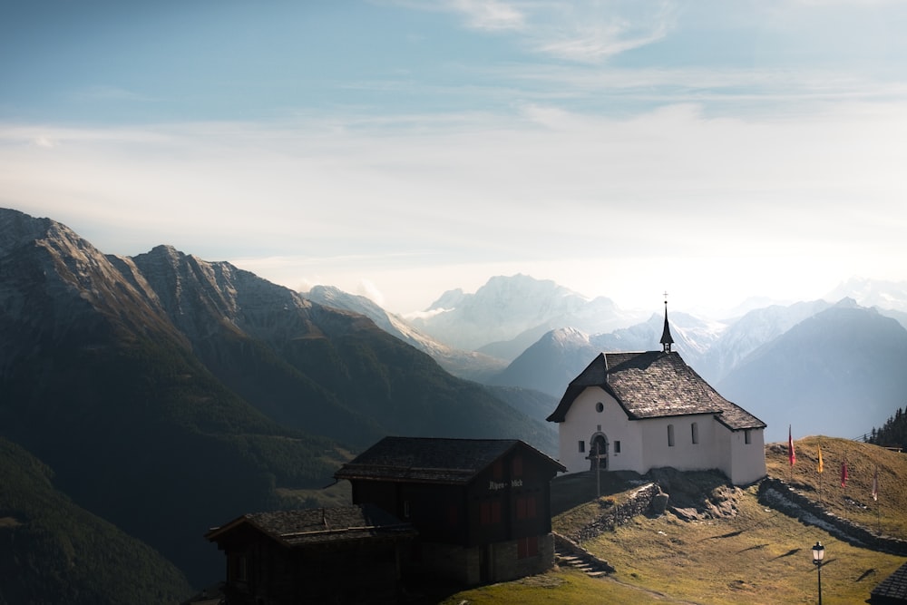 white house on mountain during daytime