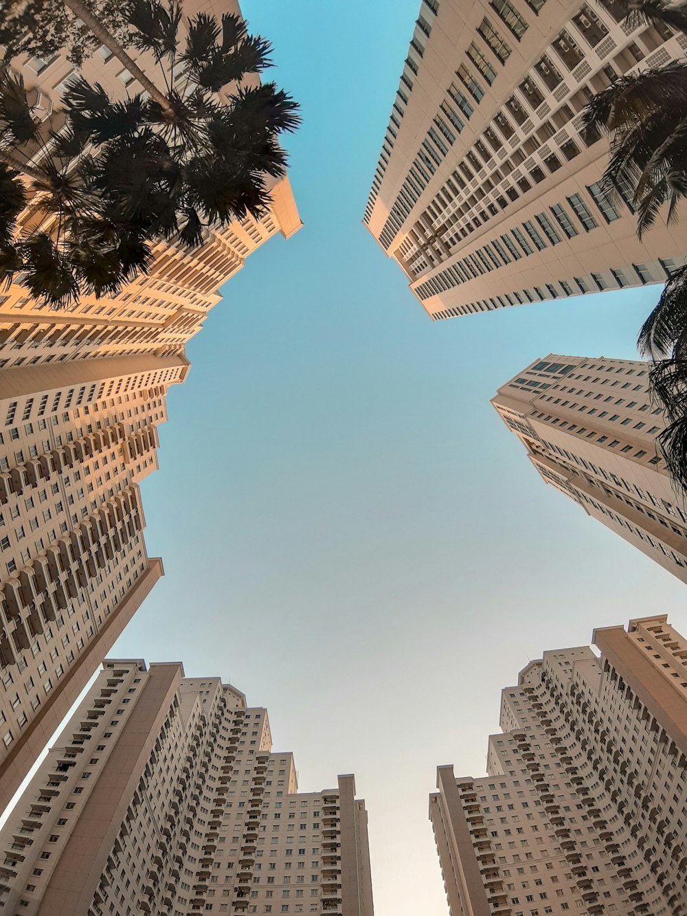 low-angel photography of brown high-rise building