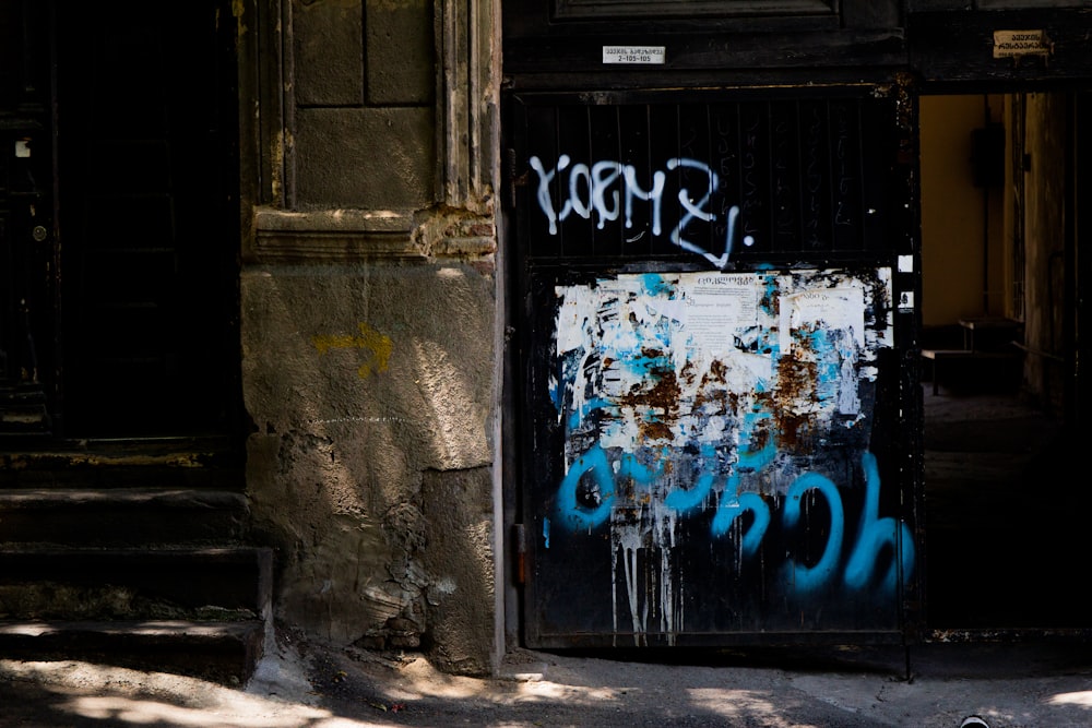 a door that has some graffiti on it