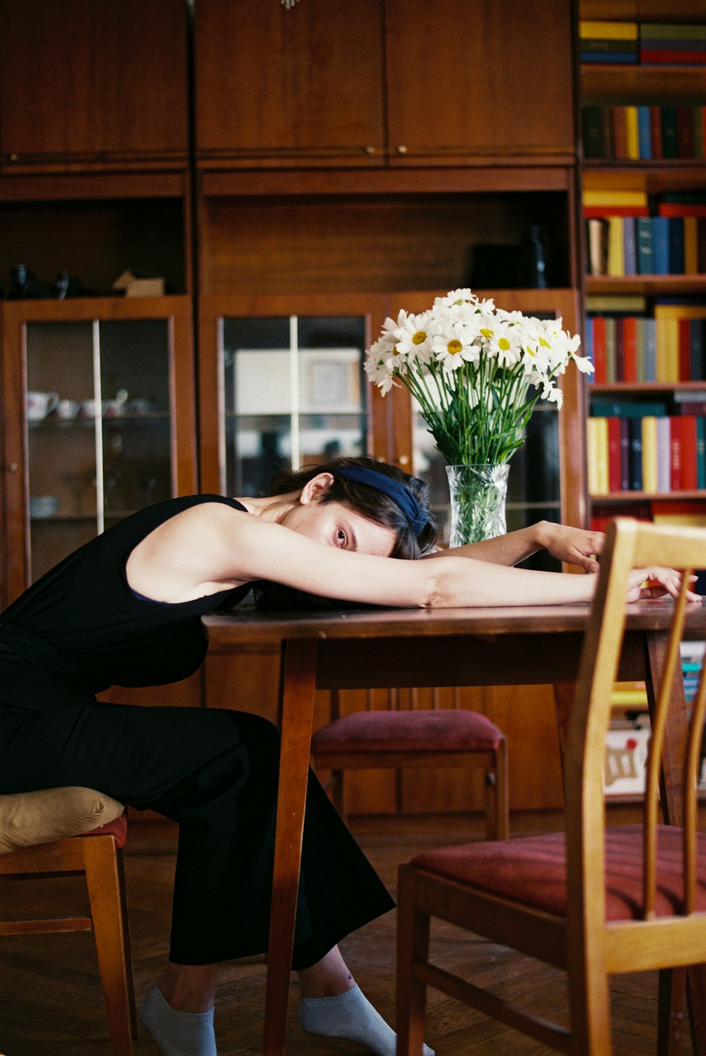 woman sitting on chair in room