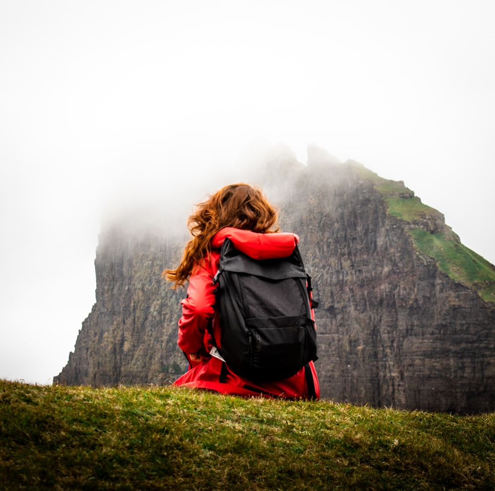 woman near rock formation