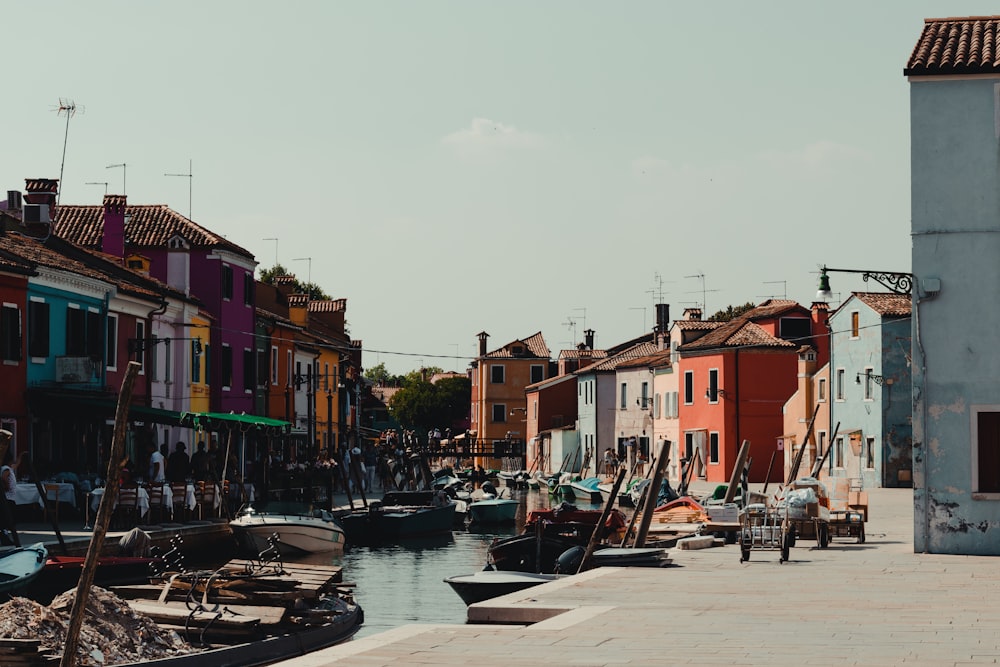 boats parked between buildings