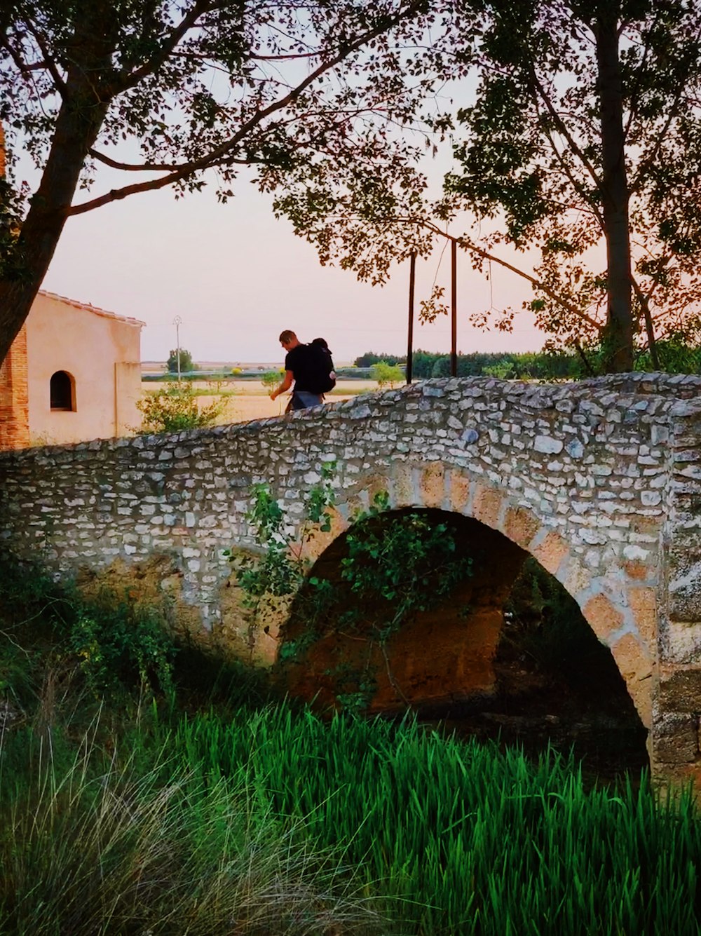 man walking on brick bride