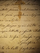 a close up of a handwriting on a piece of paper