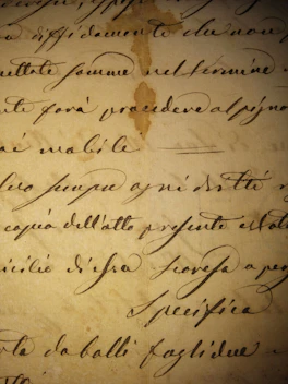 a close up of a handwriting on a piece of paper