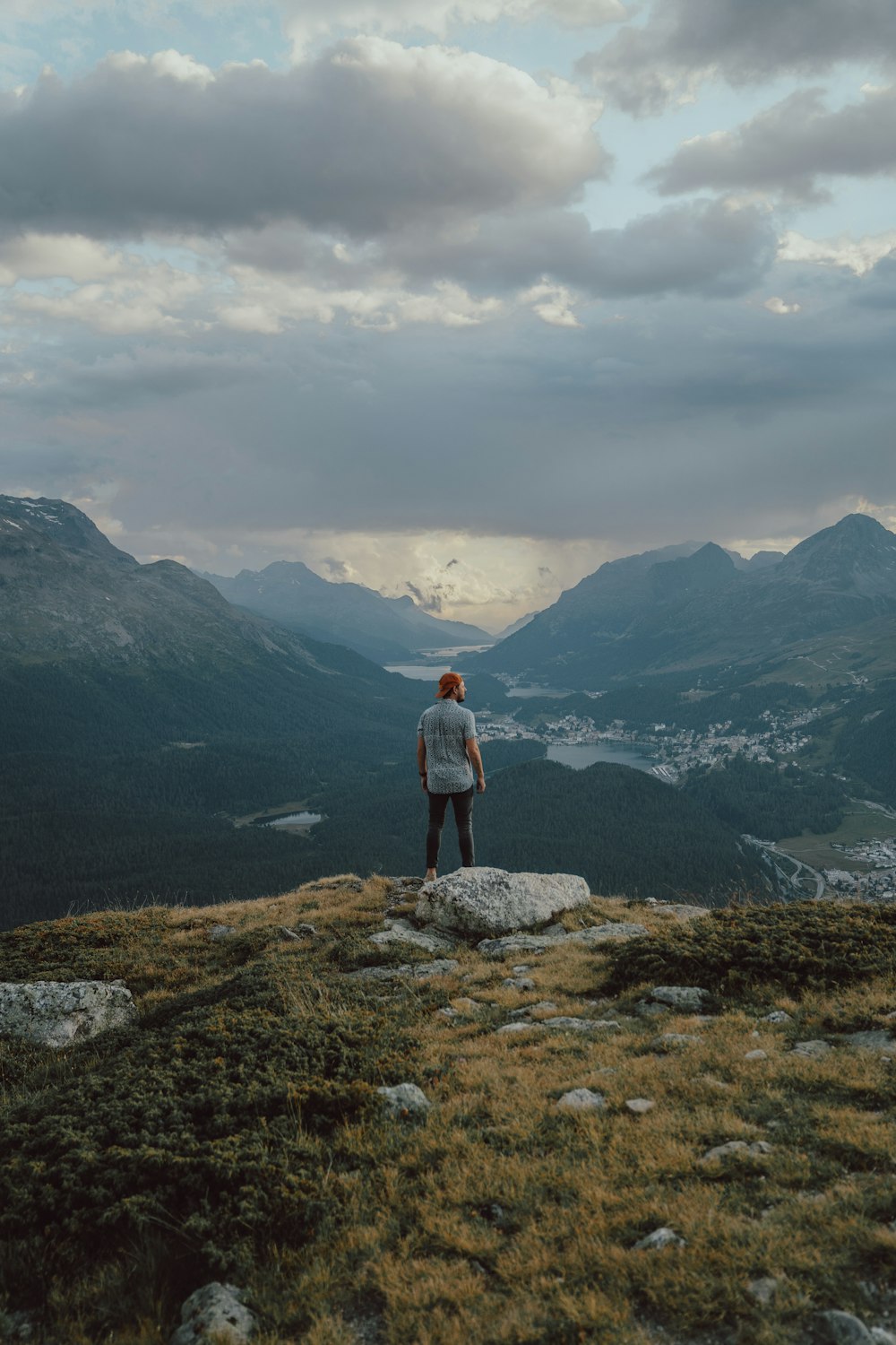 man standing on top of hill