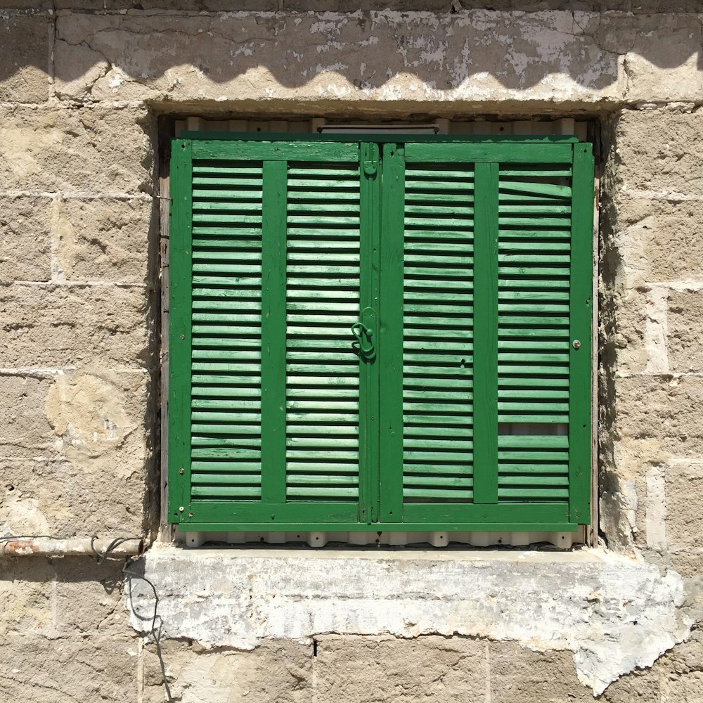 green wooden windows