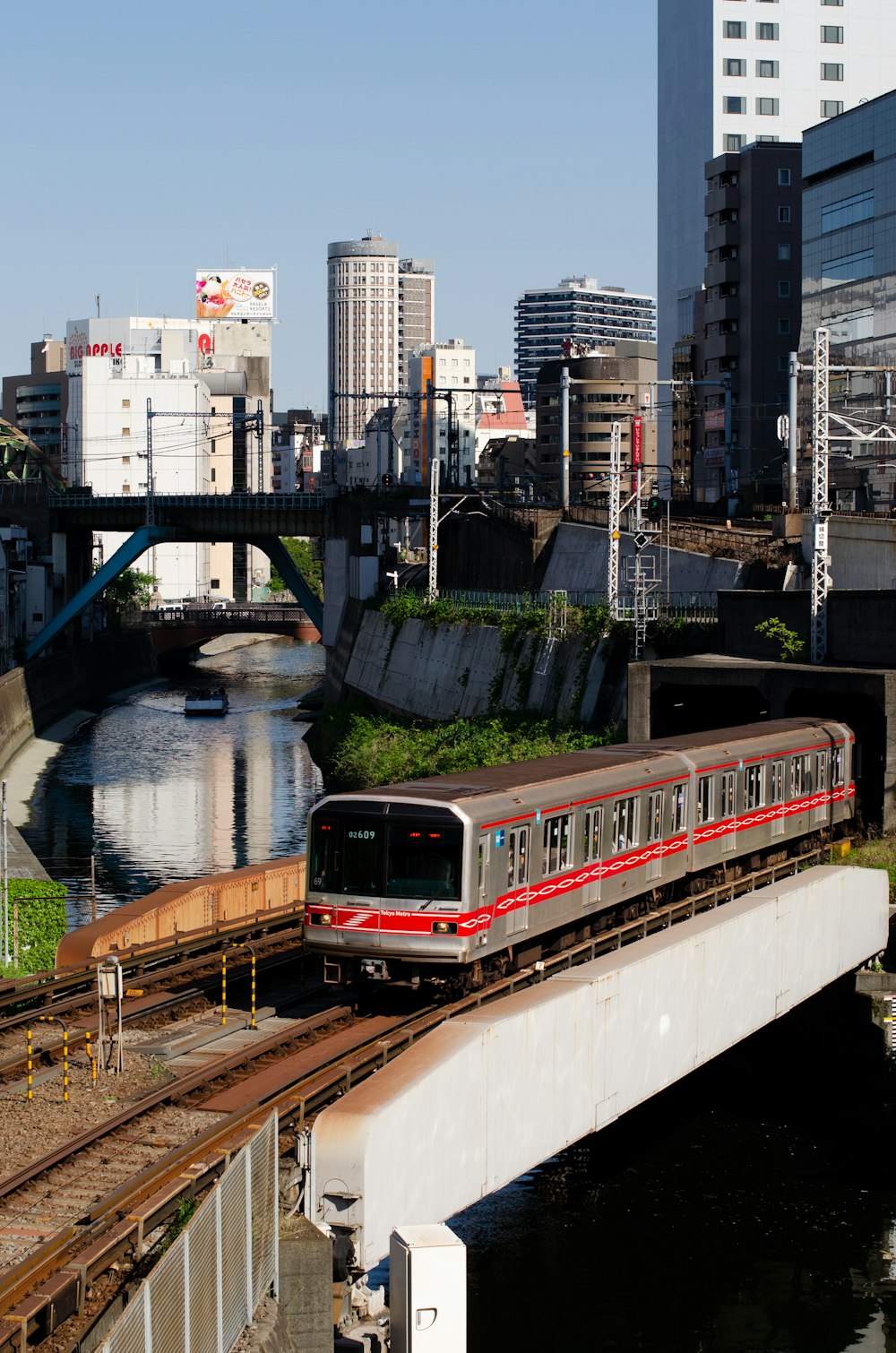 gray and red train