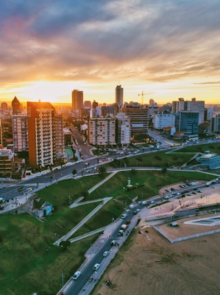 aerial photography of high-rise building beside seashore during daytime