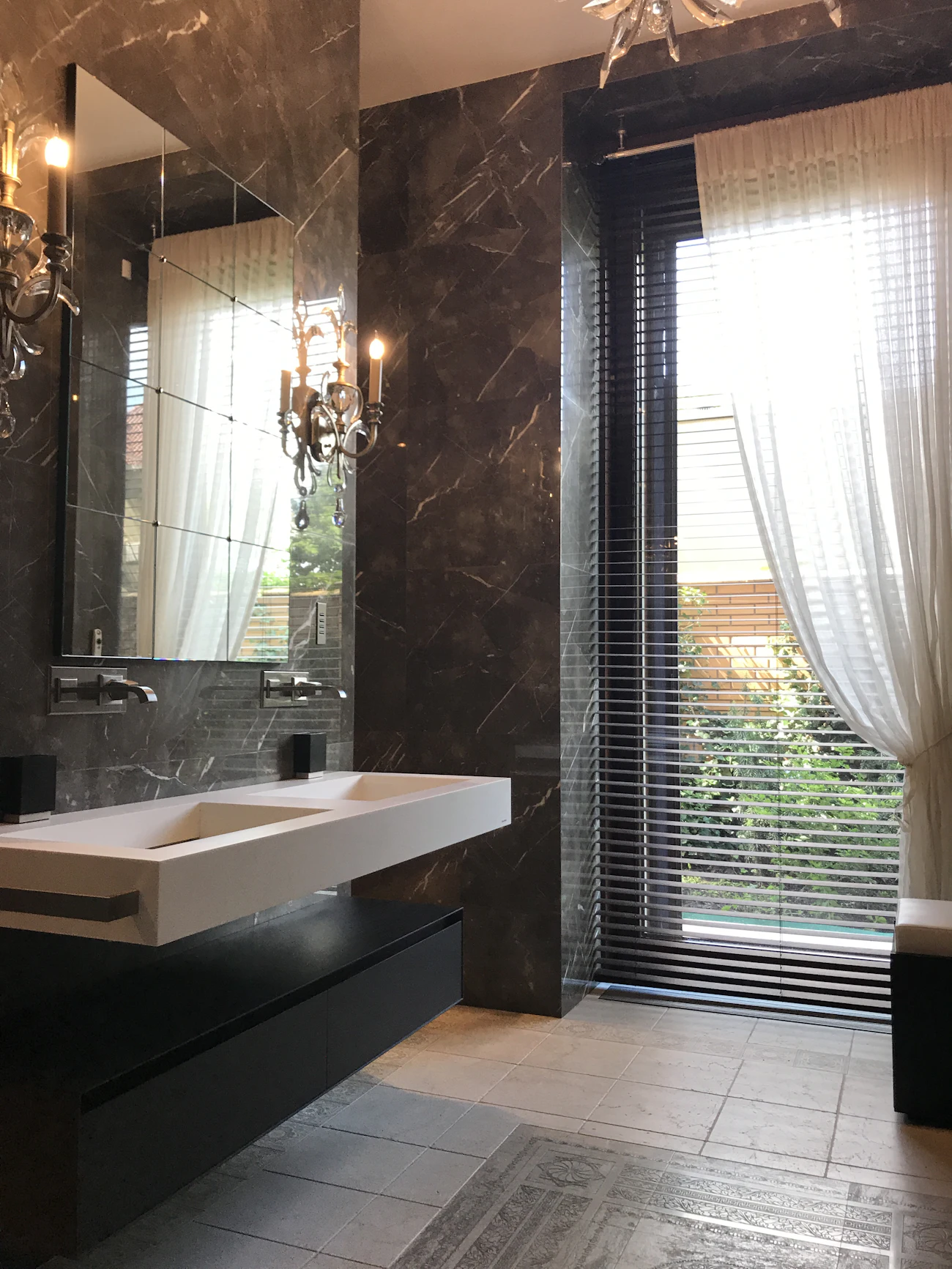 Bathroom vanity with two sinks and steel faucets