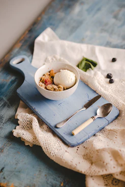 cooked egg and round white ceramic bowl