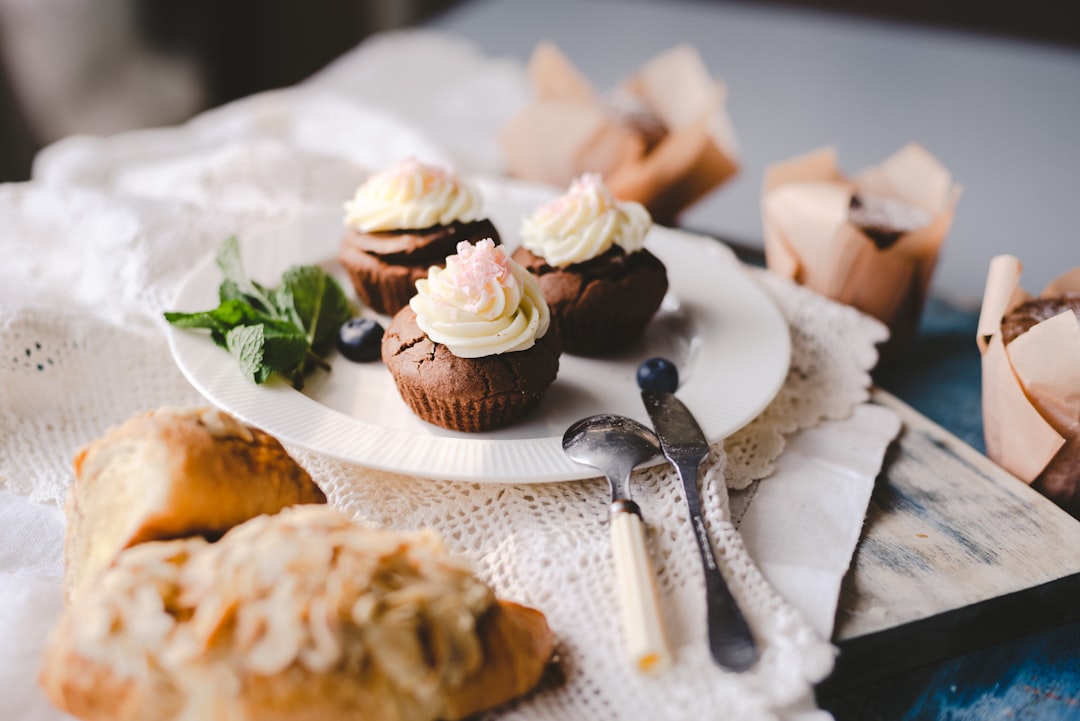 chocolate cupcakes on white ceramic plate