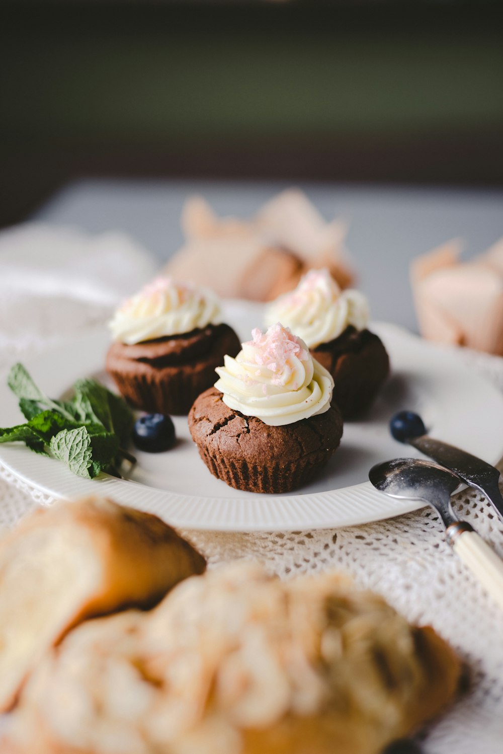 three chocolate cupcakes