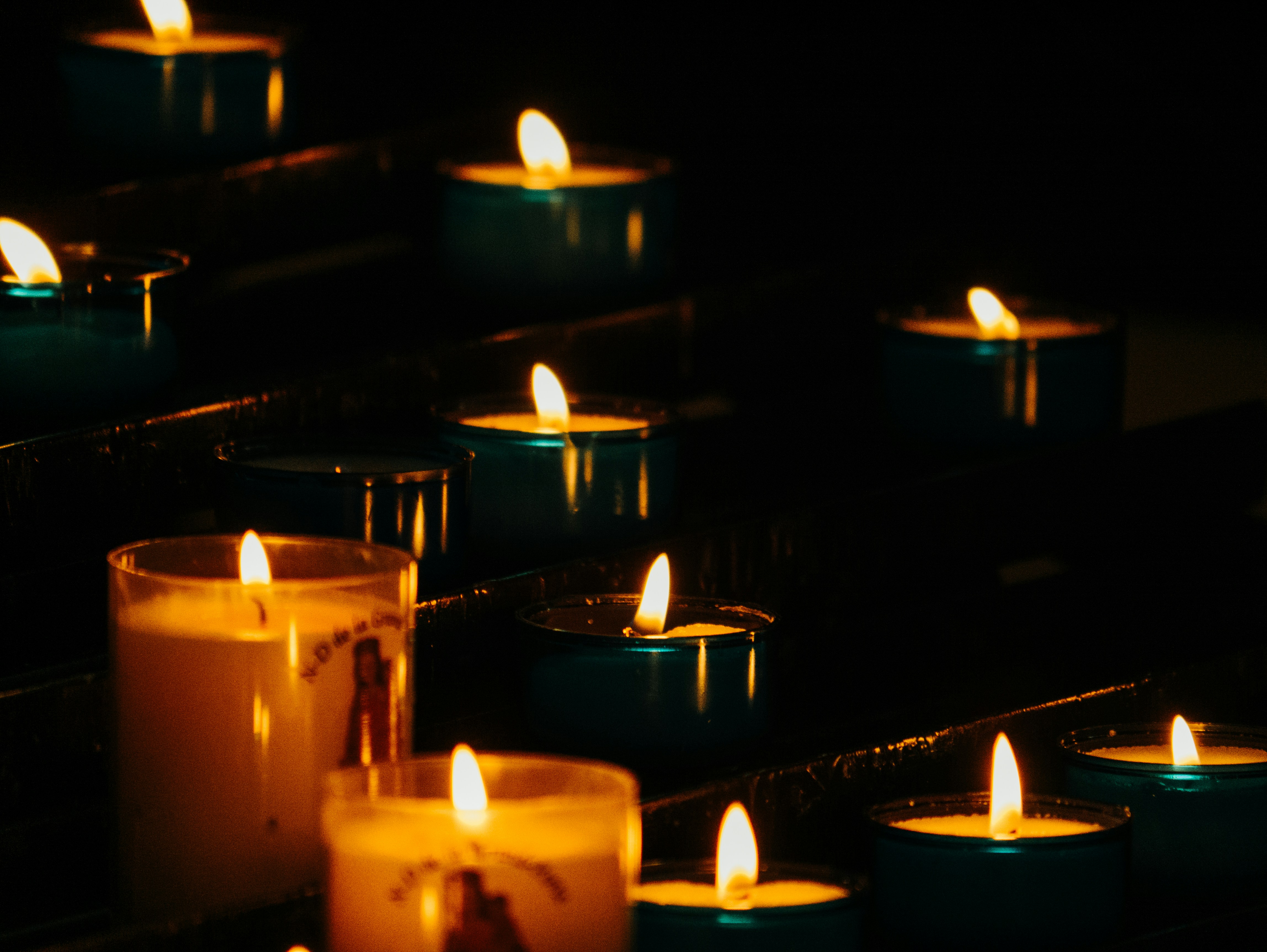 Lighted votive and tealight candles photo Free Flame Image on Unsplash