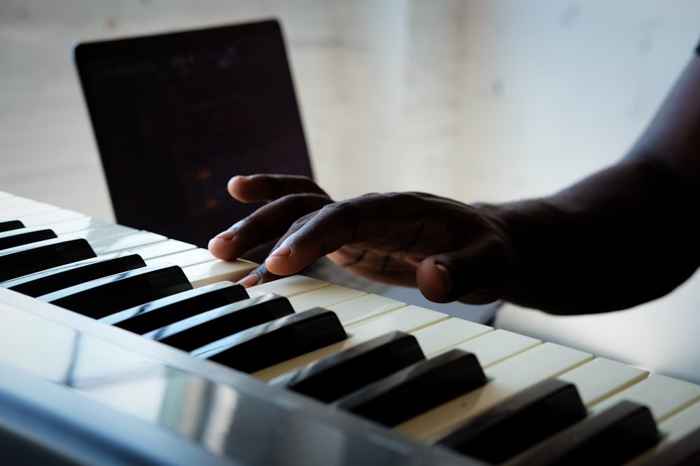 person playing a piano